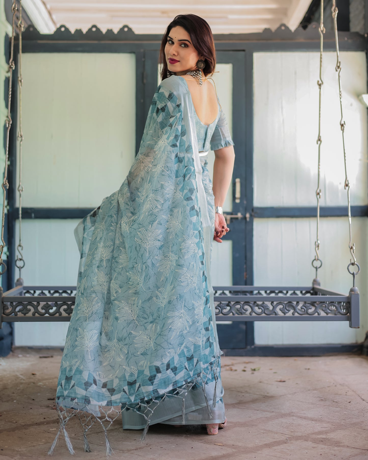 Pure Pastel Blue Linen With A Geometric Print & Delicate Floral Embroidery Saree