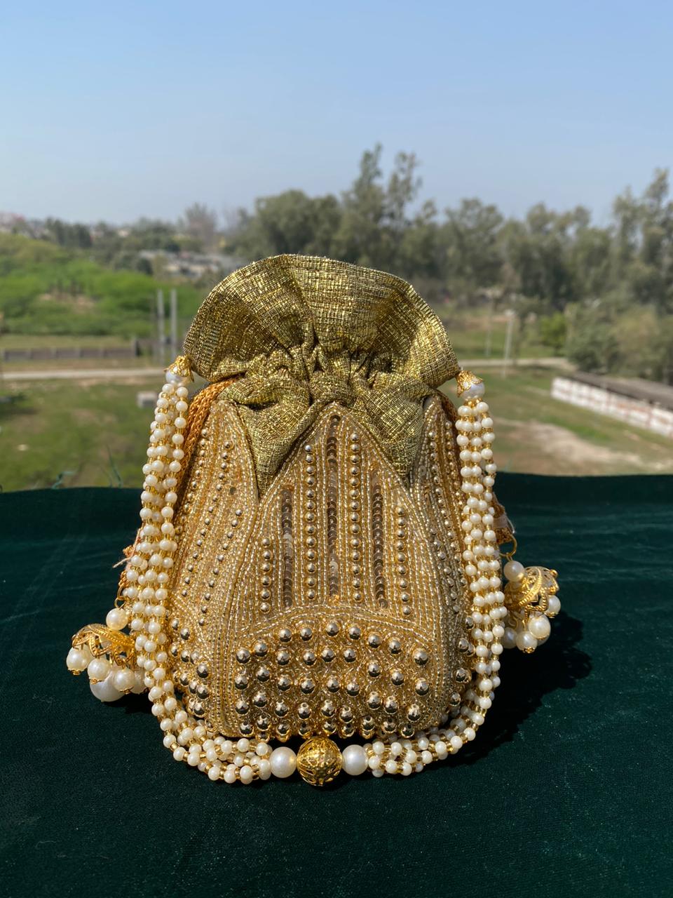 Trendy Pearl Potli Bag with Heavy Hand Embroidery – Bridal & Festive Collection
