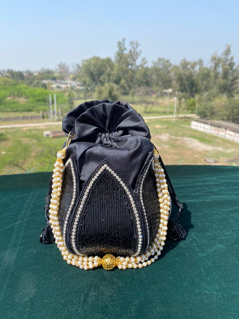 Trendy Black Pearl Potli Bag with Heavy Hand Embroidery – Bridal & Festive Collection