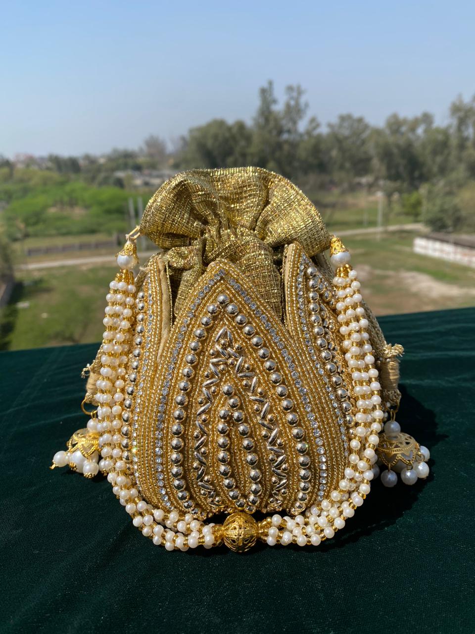 Trendy Pearl Potli Bag with Heavy Hand Embroidery – Bridal & Festive Collection