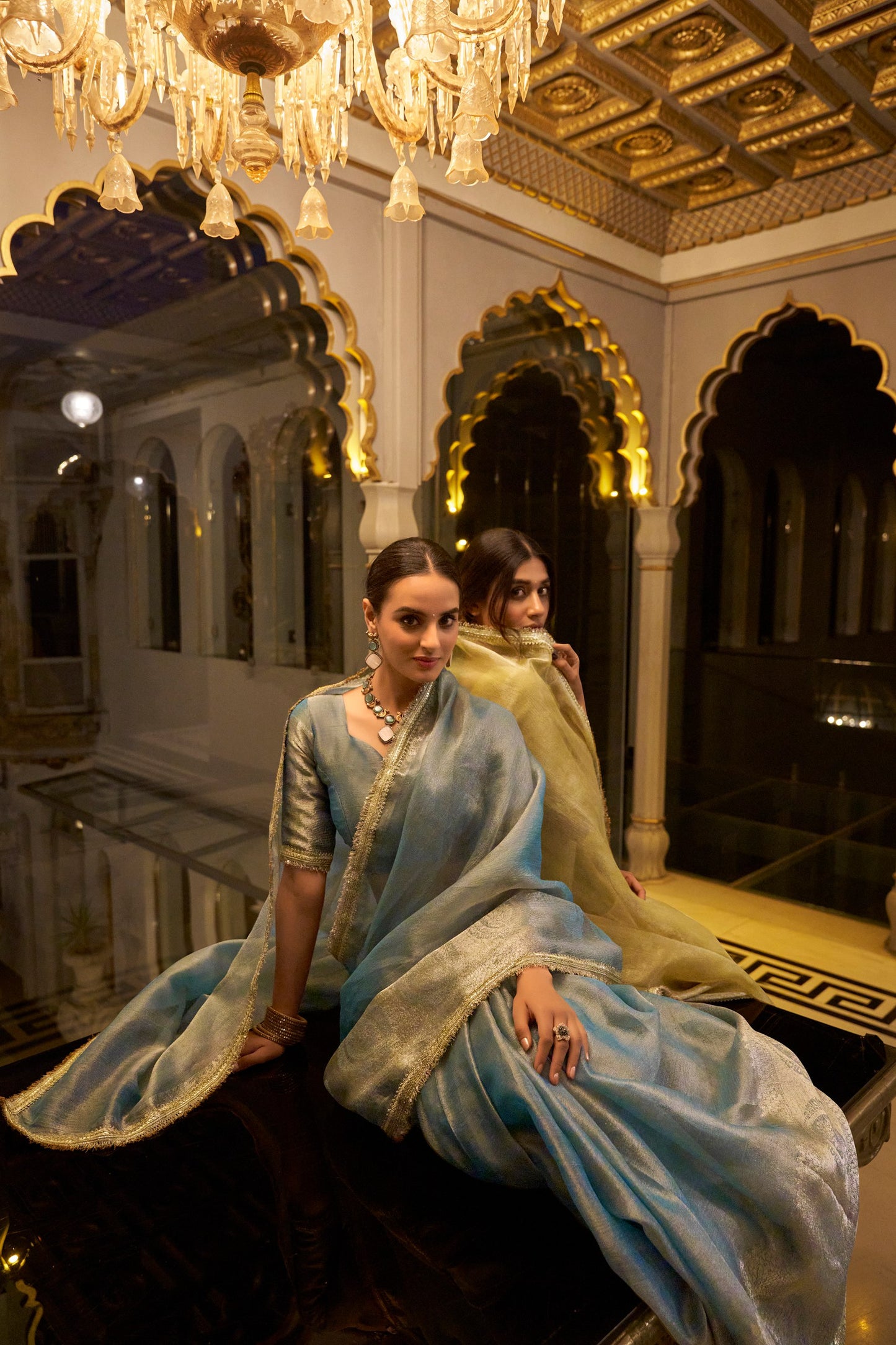 Tissue Shimmer Sky Blue Saree with Zari Weaving and Sequins Lace Border