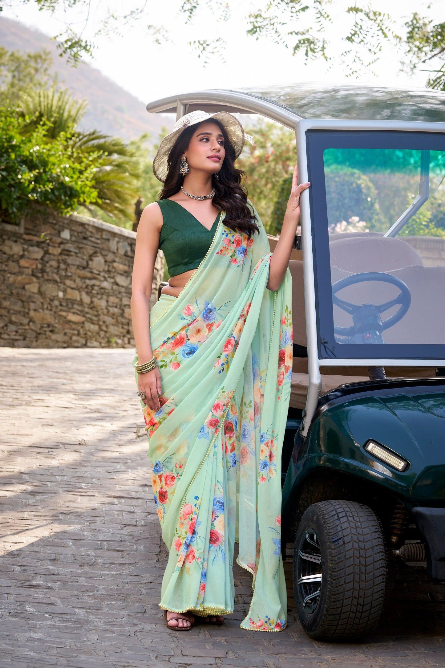 Weightless Marbal Floral Printed Pista Green Saree with Pearl Lace Border