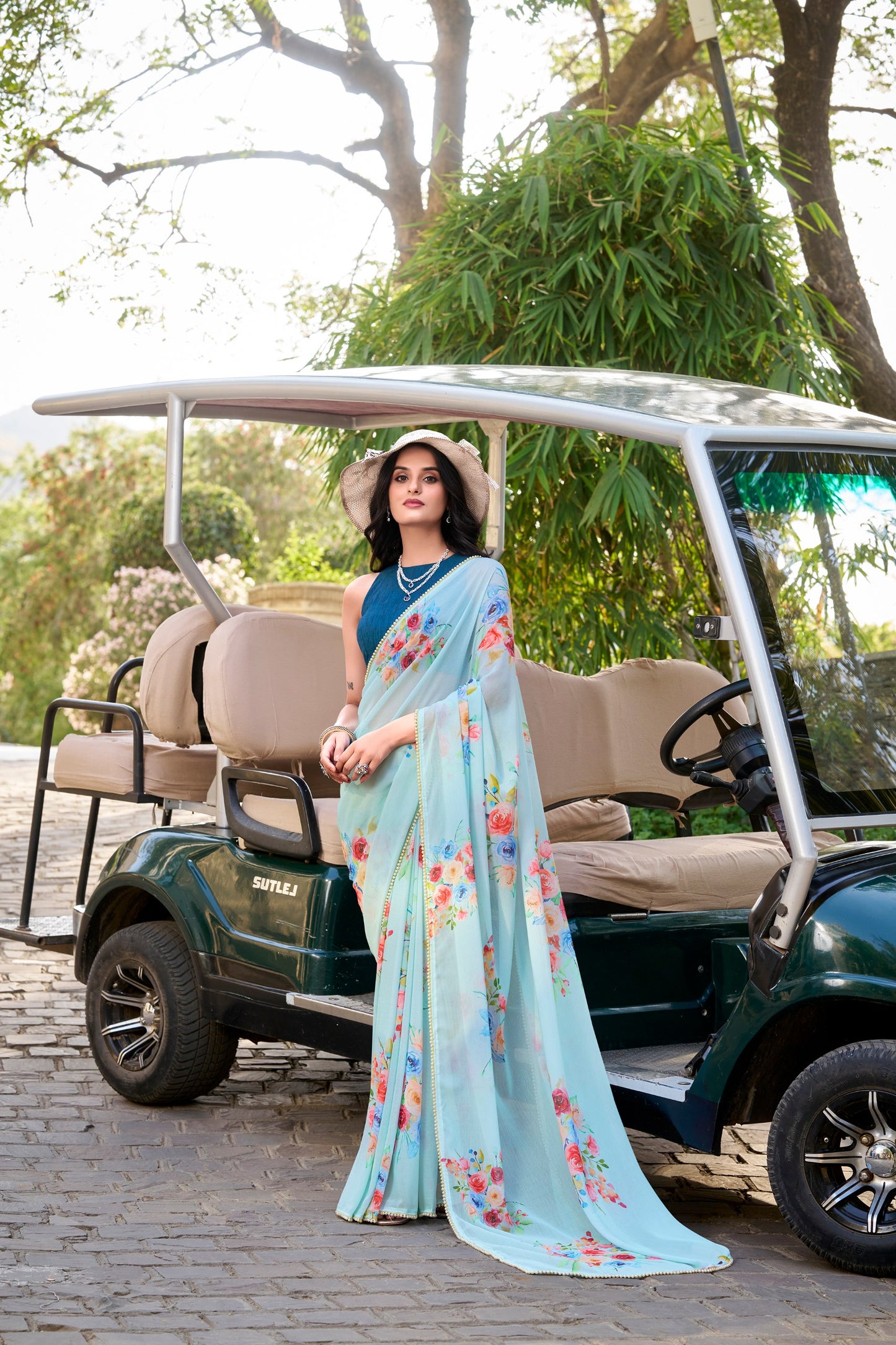 Weightless Marbal Floral Printed Sky Blue Saree with Pearl Lace Border