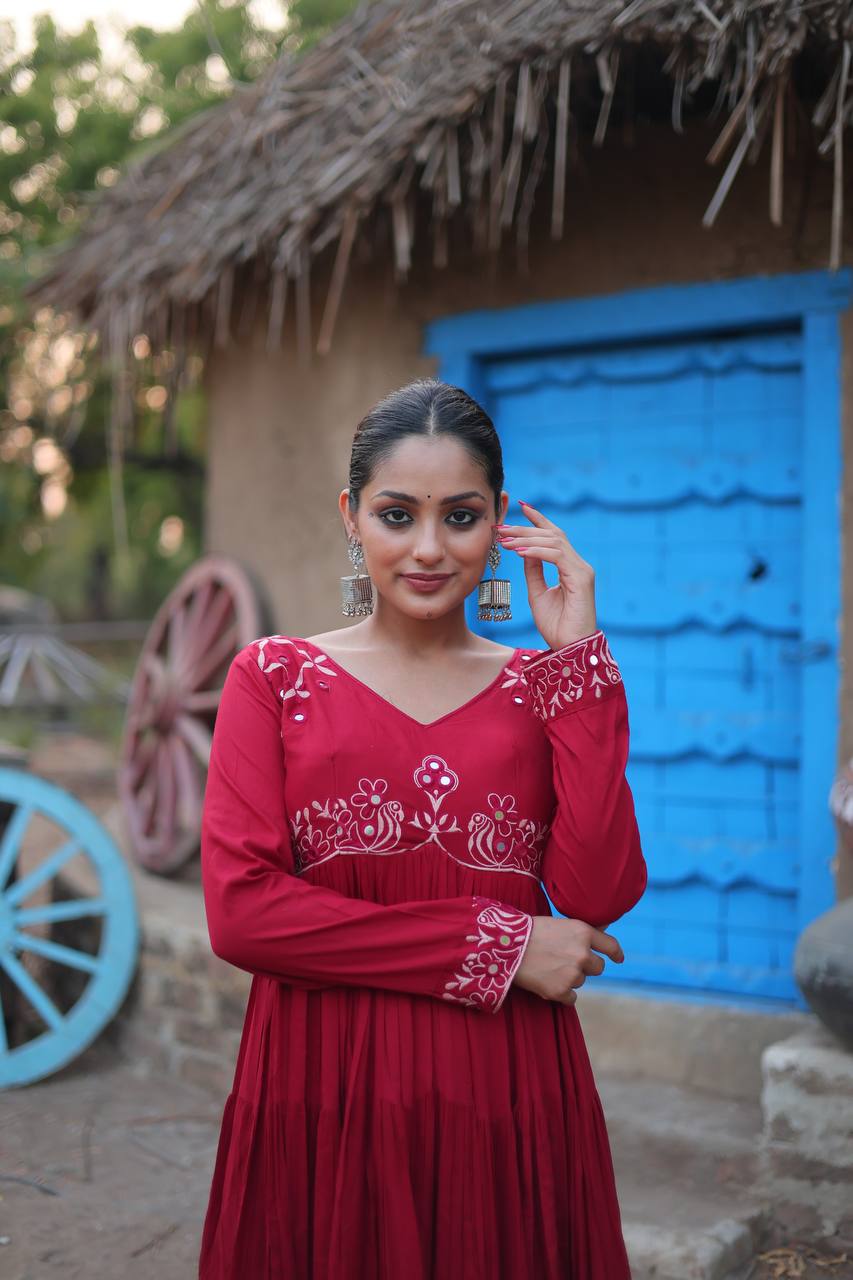 Stunning Maroon Mirror Work Rayon Navratri Wear Gown By Stylish Ethnic