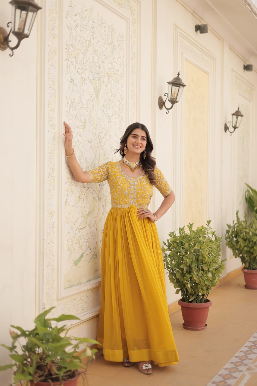 Yellow Color Faux Blooming Zari Sequence Embroidered Ethnic Gown By Stylish Ethnic