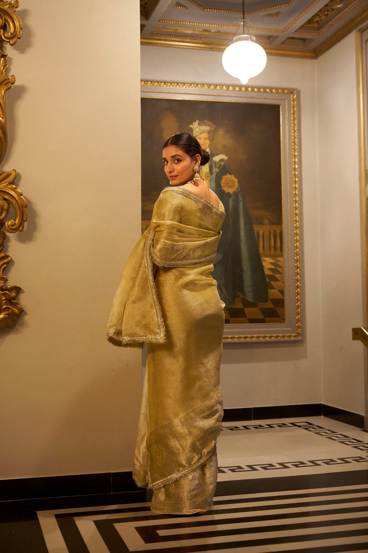 Tissue Shimmer Gold Saree with Zari Weaving and Sequins Lace Border