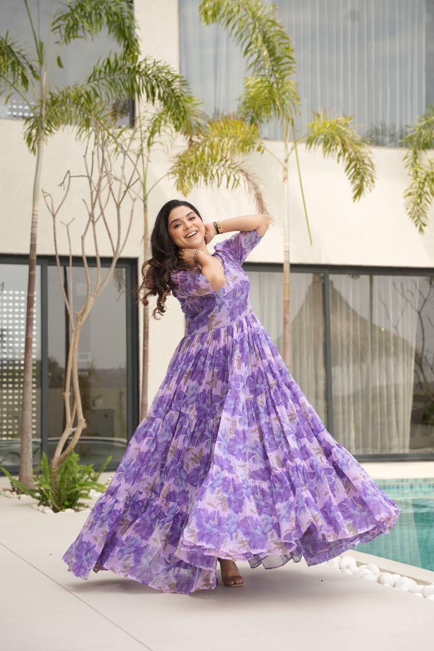 Printed Faux Georgette Purple Gown with Fancy V Neck – 12 Meter Flair Elegance