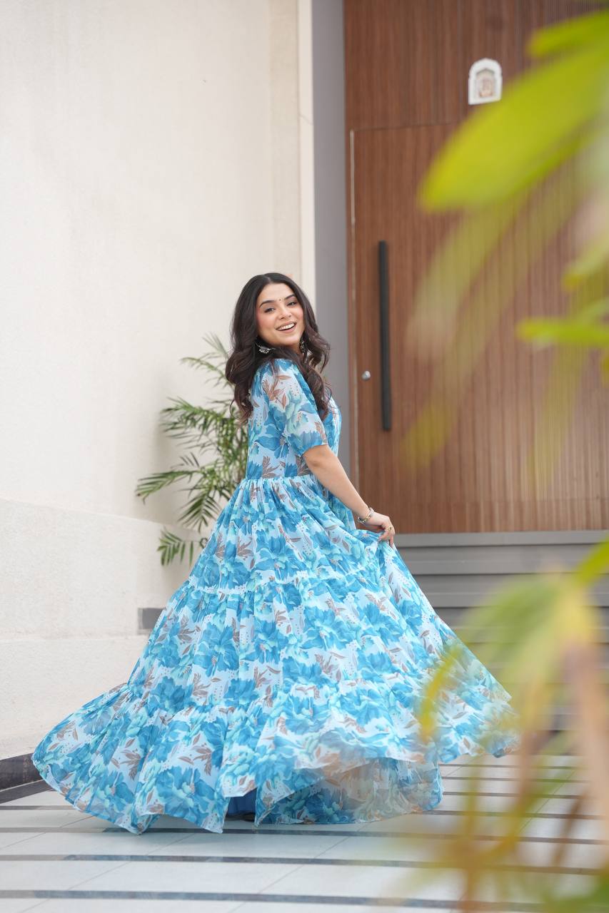 Printed Faux Georgette Blue Gown with Fancy V Neck – 12 Meter Flair Elegance