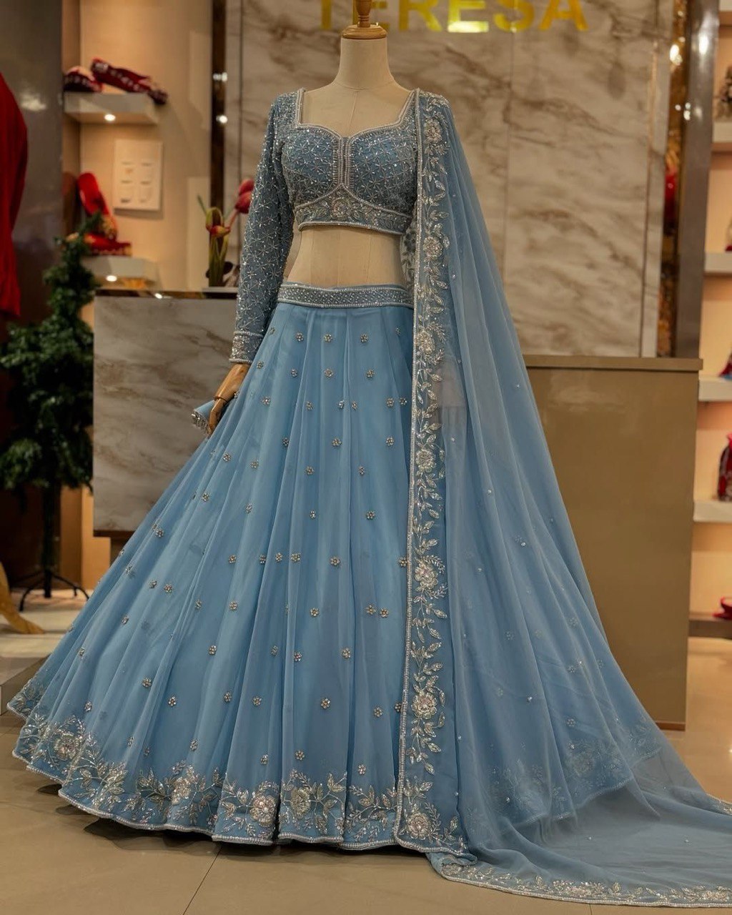Sky Blue Fox Georgette Semi-Stitched Lehenga Set with Sequin & Rivet Moti Work