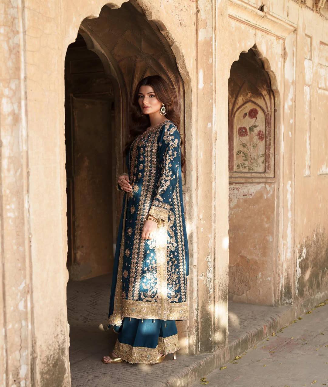Heavy Bottle Green Georgette Embroidered Suit with Moti Work