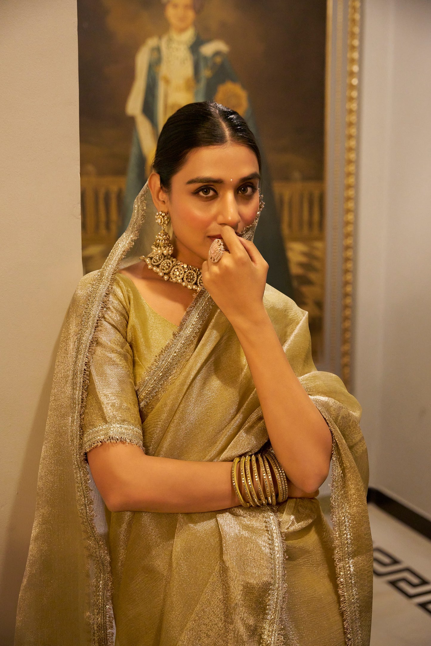 Tissue Shimmer Gold Saree with Zari Weaving and Sequins Lace Border