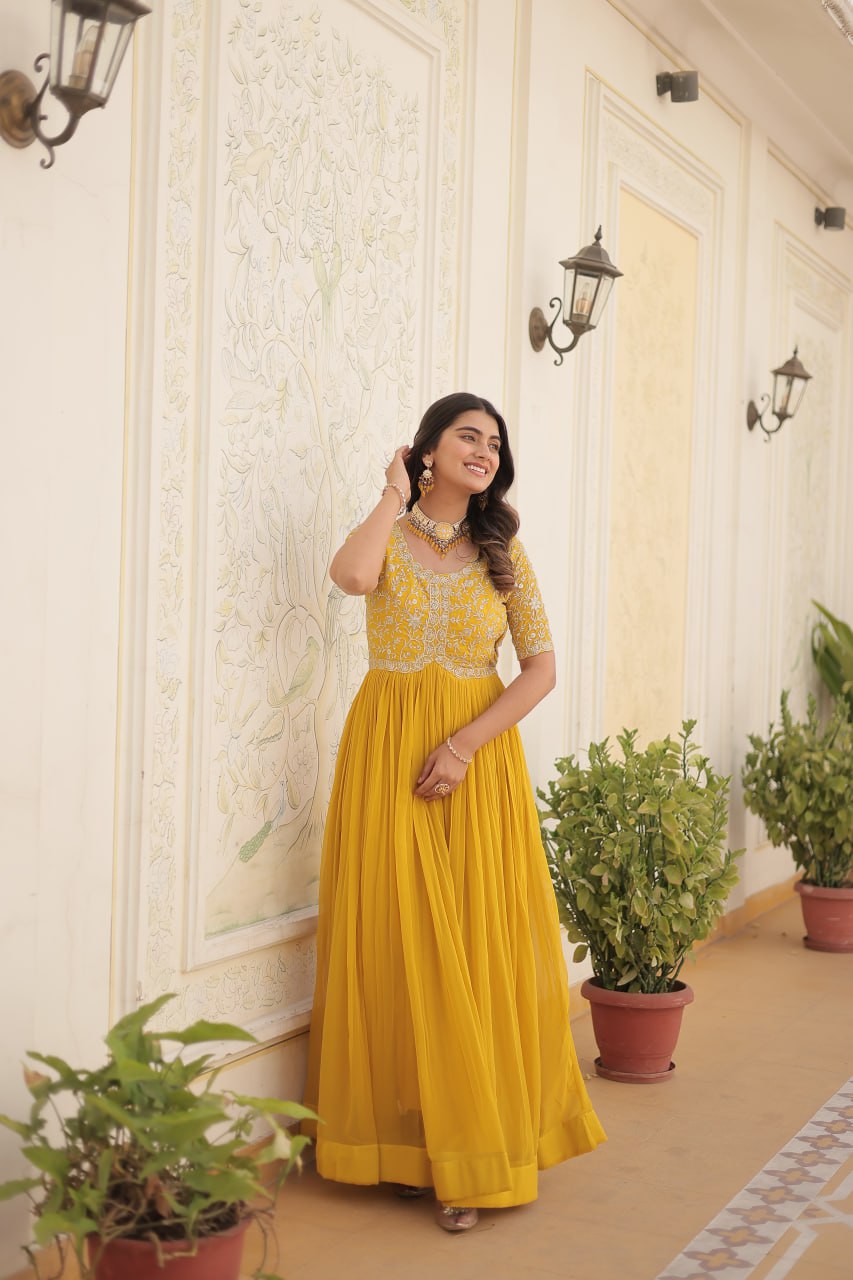 Yellow Color Faux Blooming Zari Sequence Embroidered Ethnic Gown By Stylish Ethnic