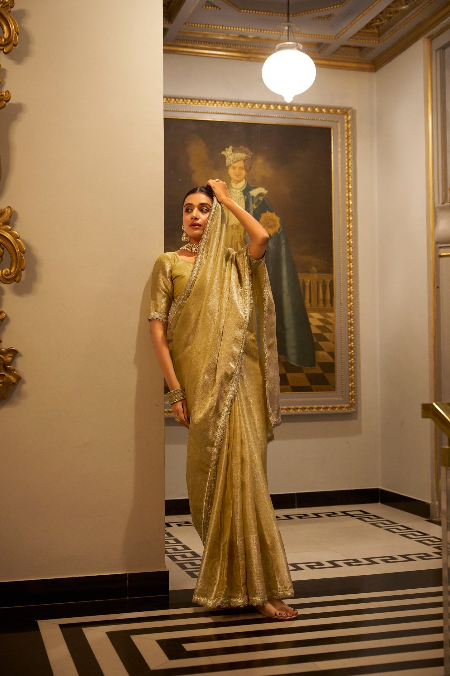 Tissue Shimmer Gold Saree with Zari Weaving and Sequins Lace Border