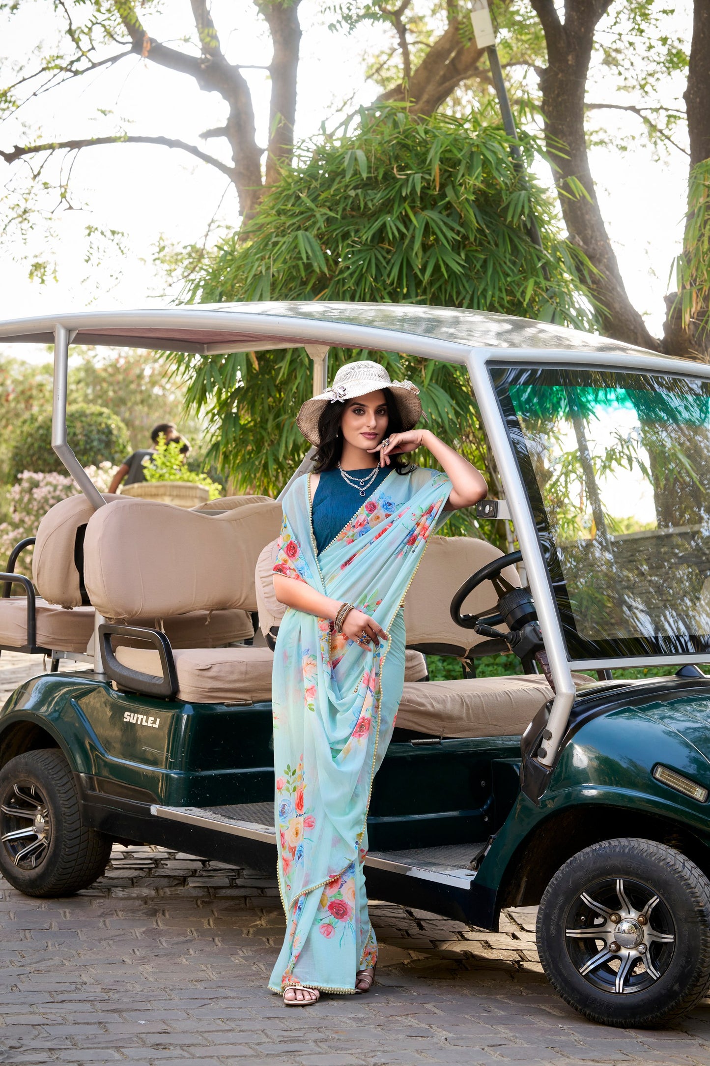 Weightless Marbal Floral Printed Sky Blue Saree with Pearl Lace Border