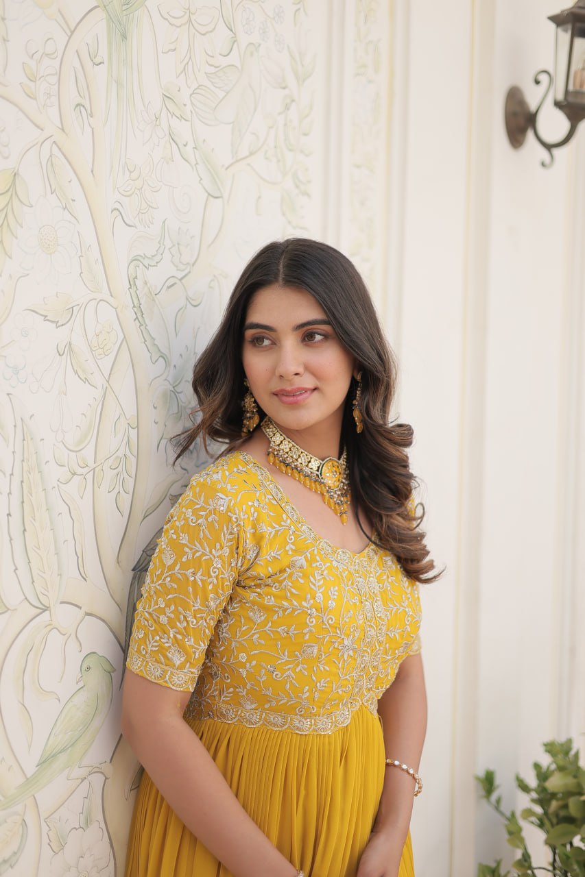 Yellow Color Faux Blooming Zari Sequence Embroidered Ethnic Gown By Stylish Ethnic