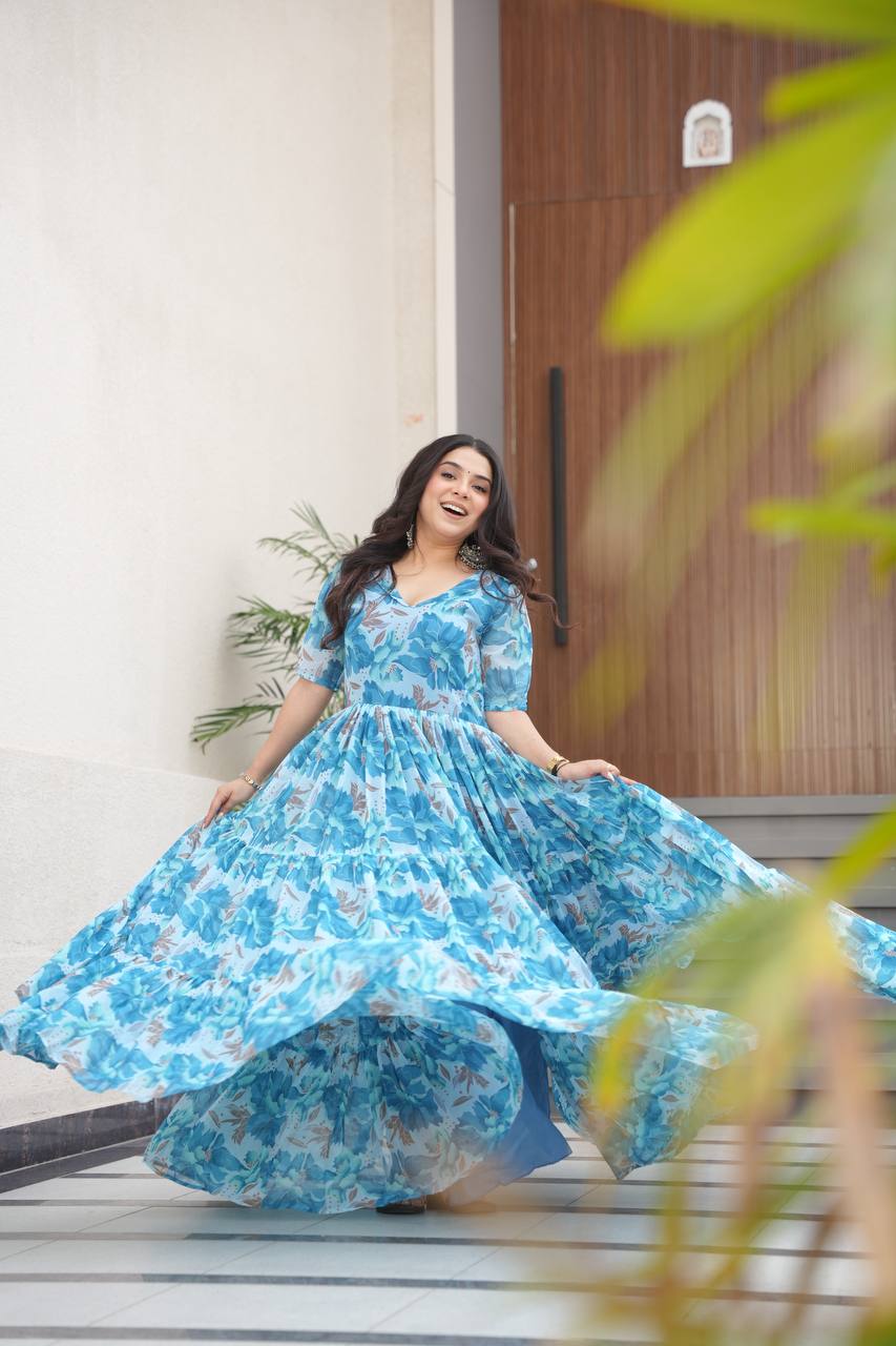 Printed Faux Georgette Blue Gown with Fancy V Neck – 12 Meter Flair Elegance