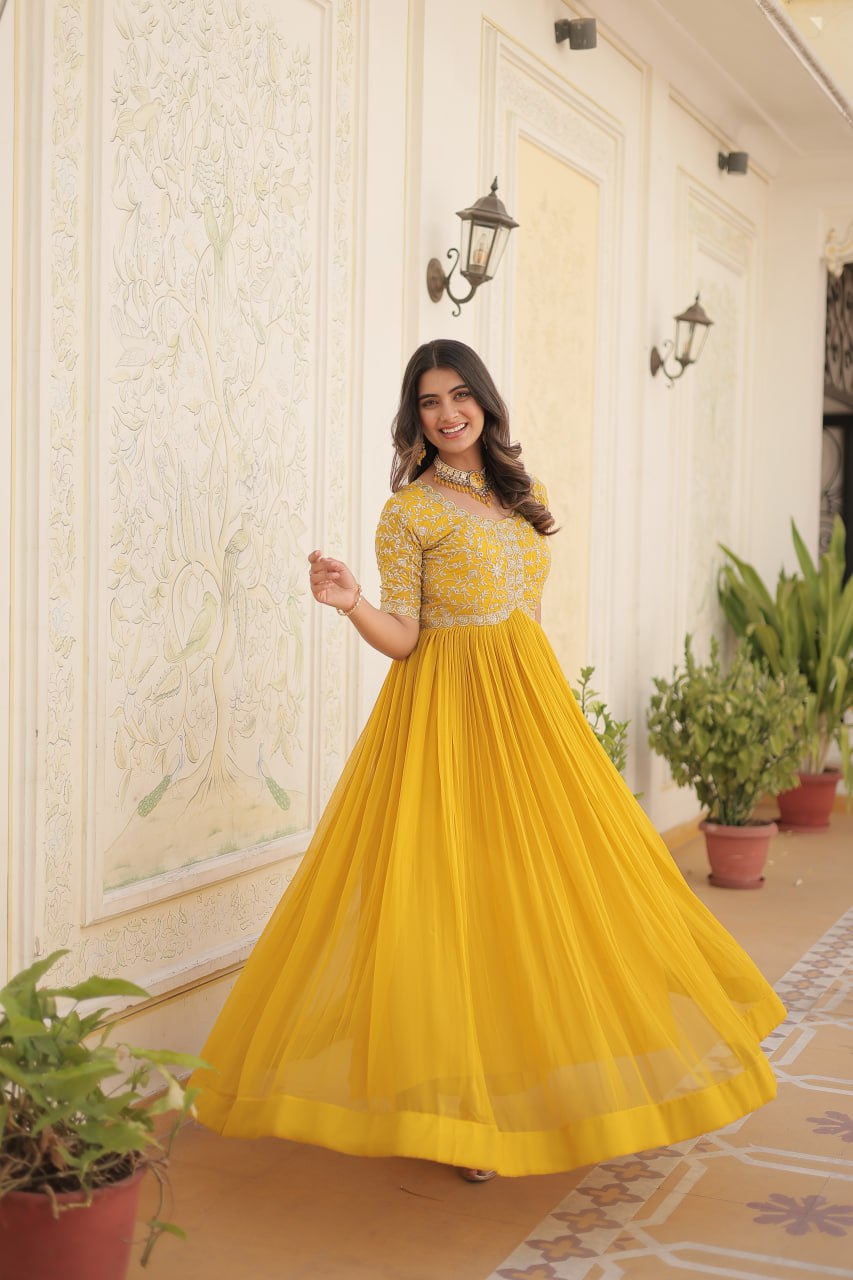 Yellow Color Faux Blooming Zari Sequence Embroidered Ethnic Gown By Stylish Ethnic
