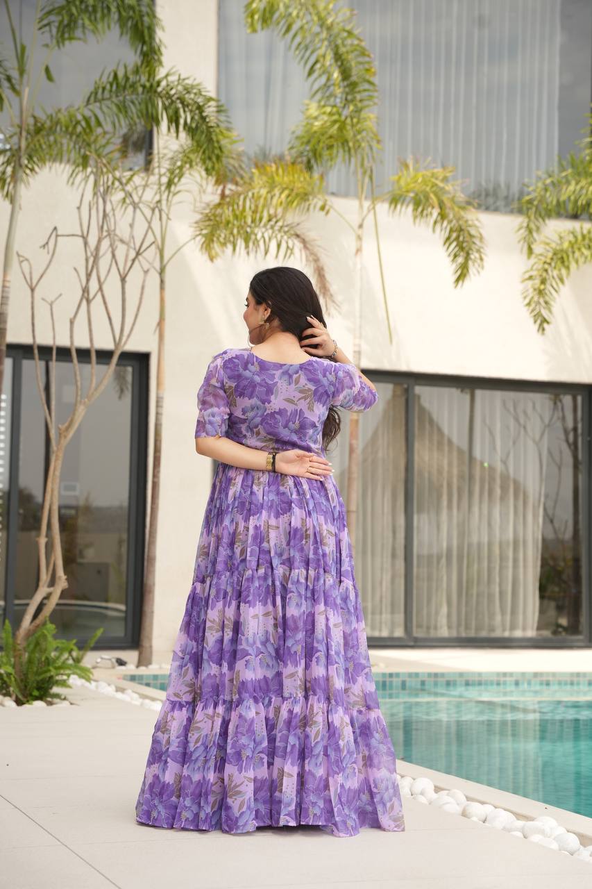 Printed Faux Georgette Purple Gown with Fancy V Neck – 12 Meter Flair Elegance