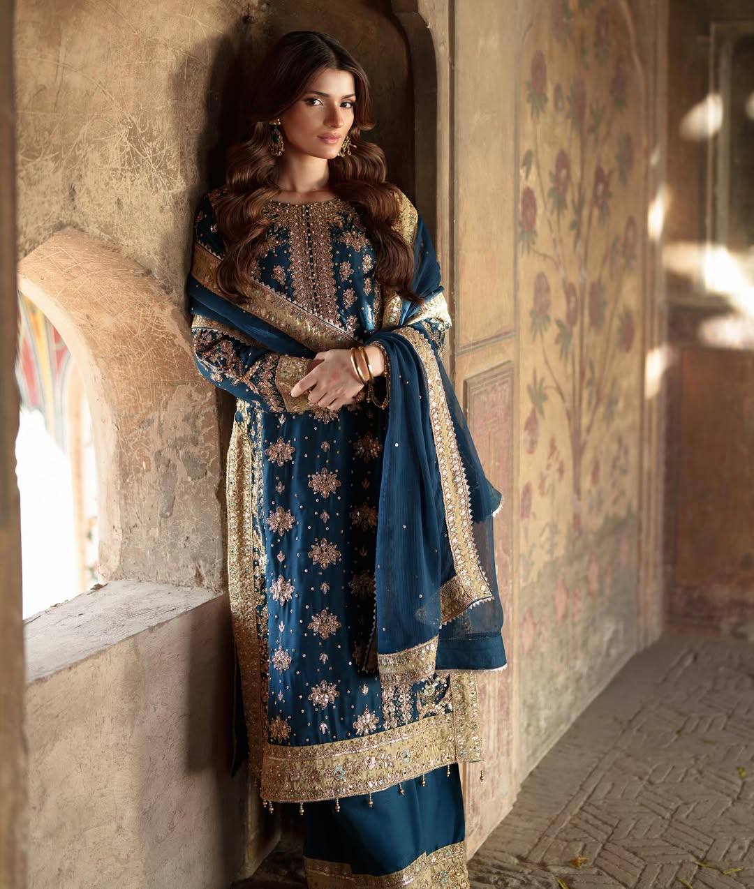 Heavy Bottle Green Georgette Embroidered Suit with Moti Work