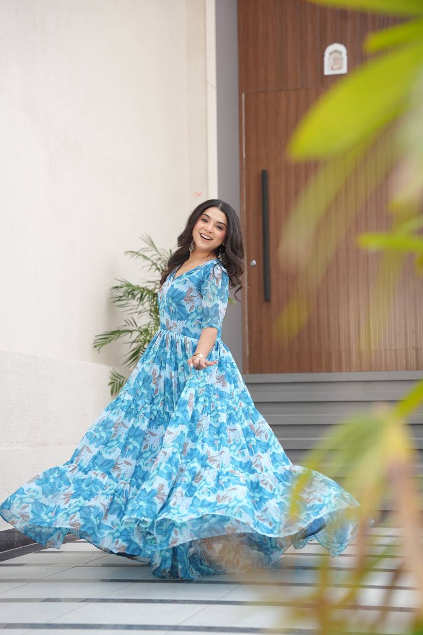 Printed Faux Georgette Blue Gown with Fancy V Neck – 12 Meter Flair Elegance