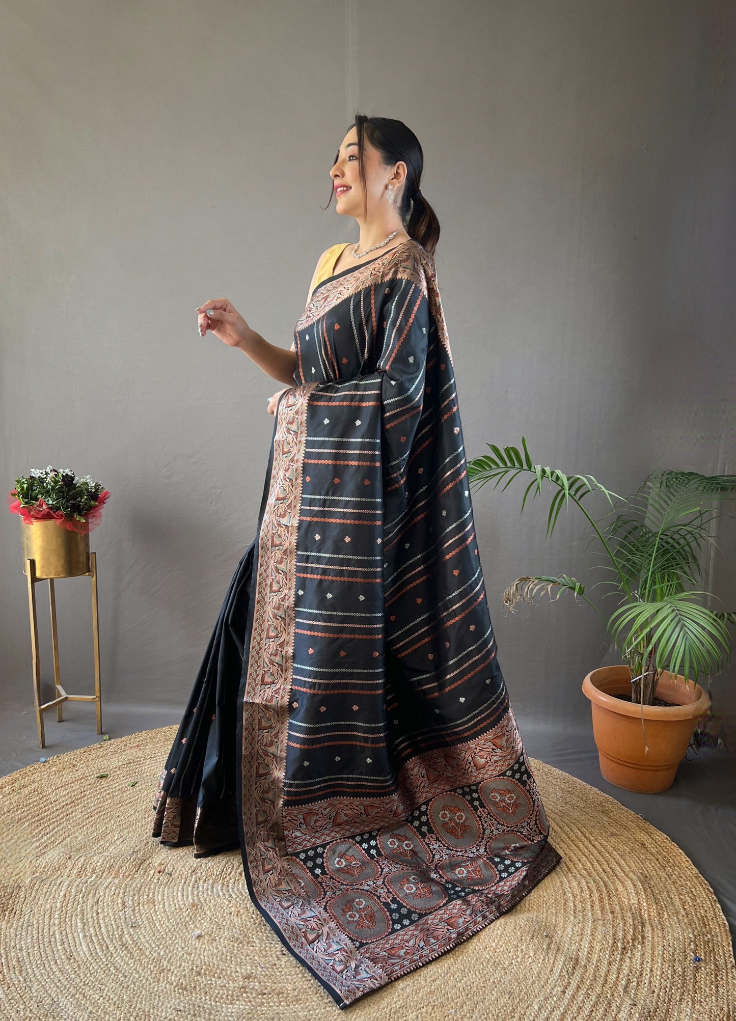 Glowing Black Soft Banarasi Silk Saree With Invaluable Blouse Piece