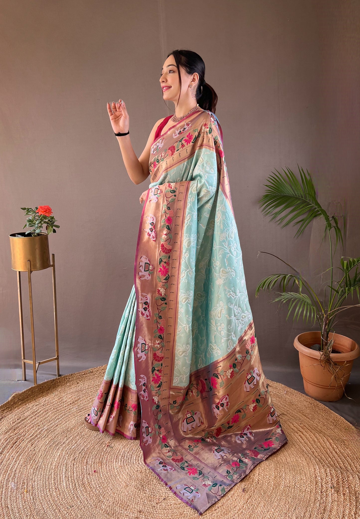 Women Paisley Sky Blue Woven Saree with Contrast Border