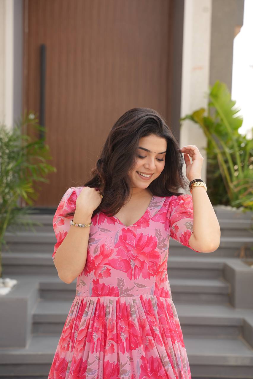 Printed Faux Georgette Pink Gown with Fancy V Neck – 12 Meter Flair Elegance