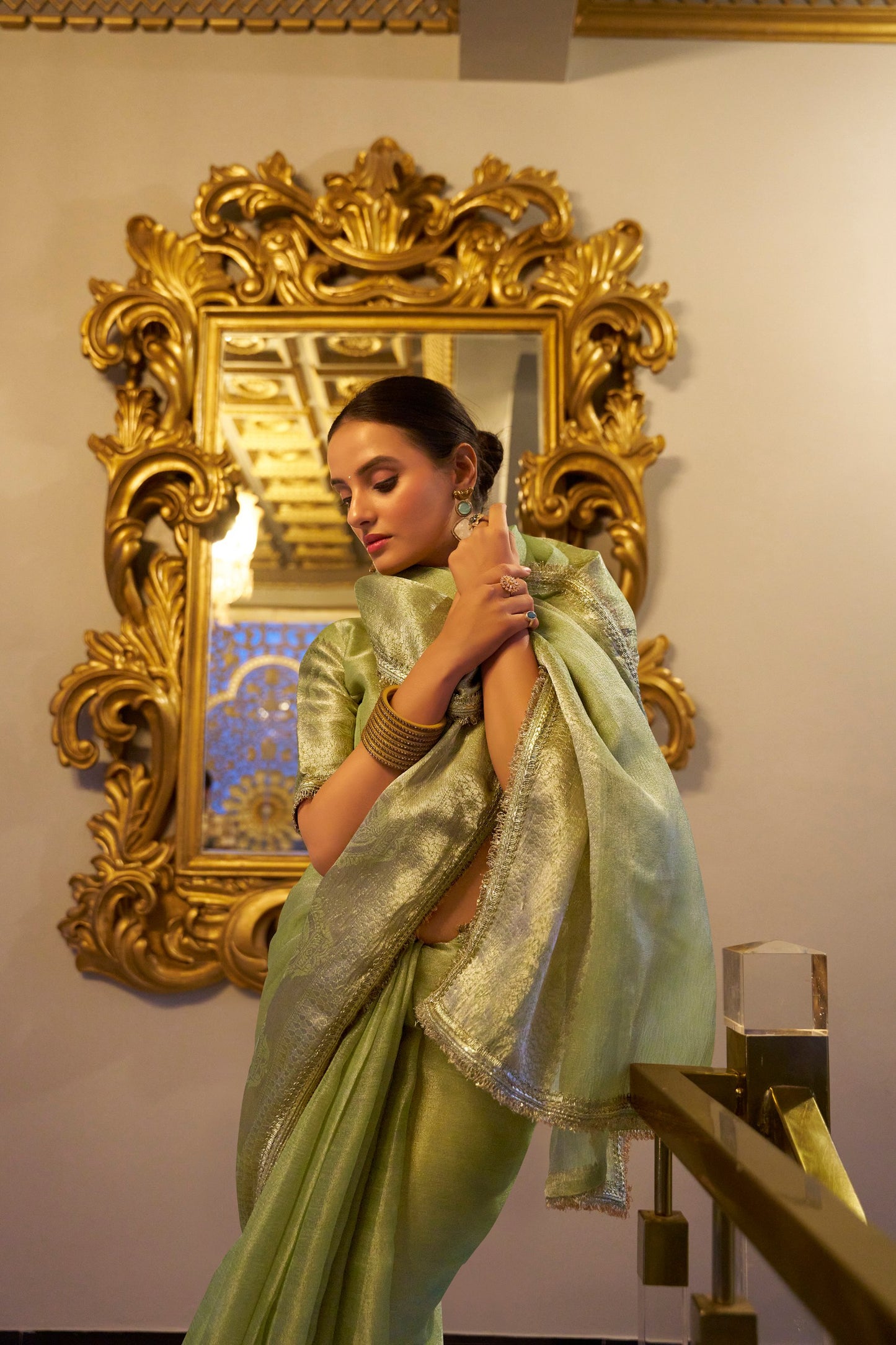 Tissue Shimmer Pista Green Saree with Zari Weaving and Sequins Lace Border