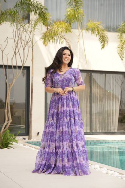Printed Faux Georgette Purple Gown with Fancy V Neck – 12 Meter Flair Elegance