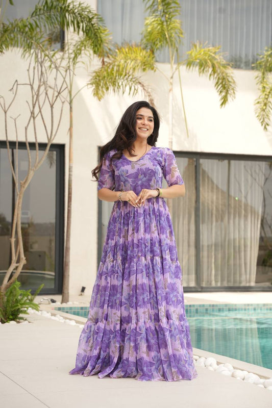 Printed Faux Georgette Purple Gown with Fancy V Neck – 12 Meter Flair Elegance
