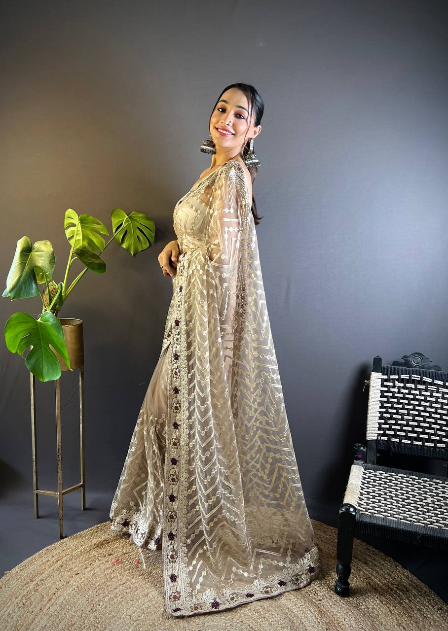 Cream Net Embellished Saree With Unstitched Blouse