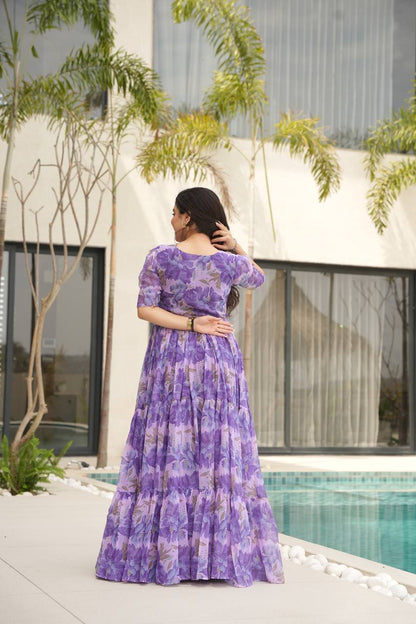 Printed Faux Georgette Purple Gown with Fancy V Neck – 12 Meter Flair Elegance