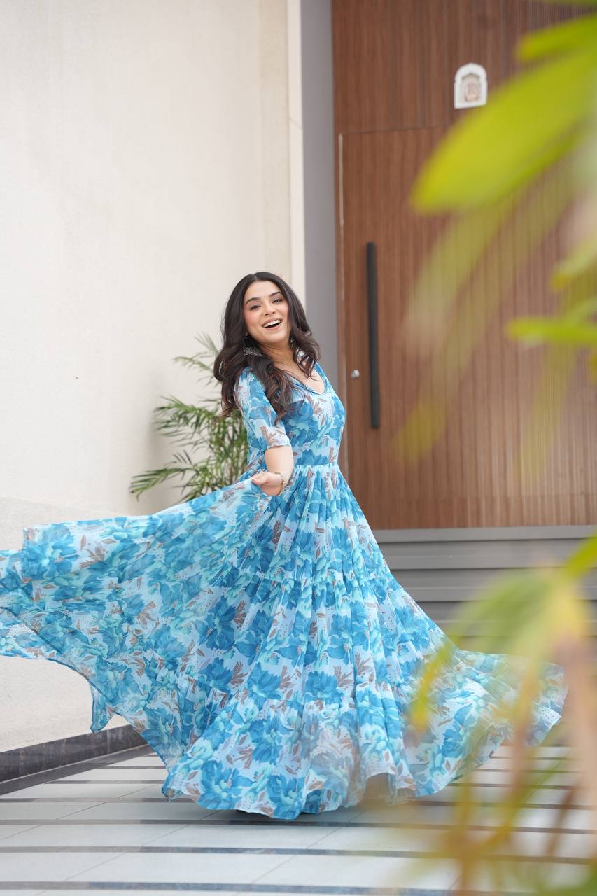 Printed Faux Georgette Blue Gown with Fancy V Neck – 12 Meter Flair Elegance