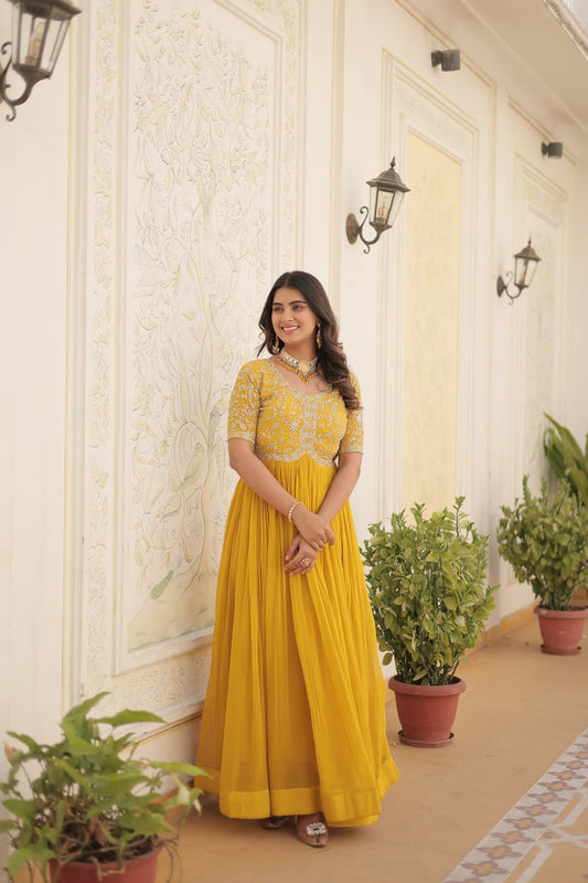 Yellow Color Faux Blooming Zari Sequence Embroidered Ethnic Gown By Stylish Ethnic